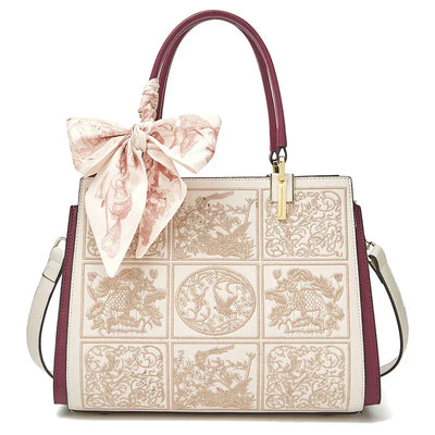 Sylvia™ – Výjimečná crossbody taška s výšivkou a mašlí